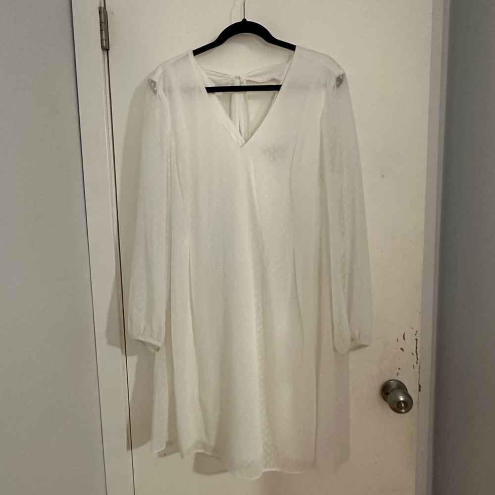 Short white dress with long sleeves